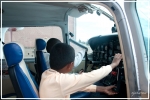each pupil sat in the cockpit of a small cessna Aircraft. 